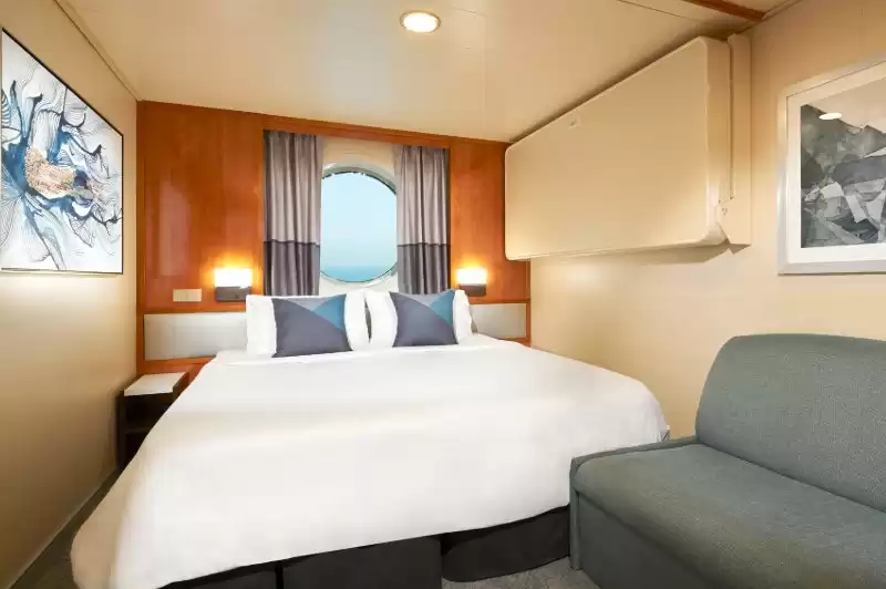 Cabine extérieure avec un grand hublot